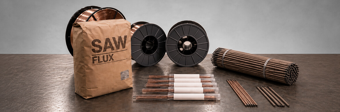 Factory welder using premium welding consumables to improve weld quality and lower production costs